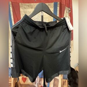 Nike Boys Black Athletic Shorts with White Swoosh and Side Accents
